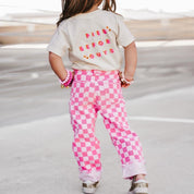 Pink checkered children’s jeans