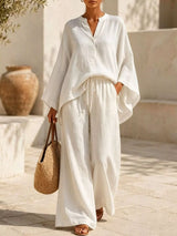 Full Size Notched Long Sleeve Top and Wide-Leg Pants Set Plus Size